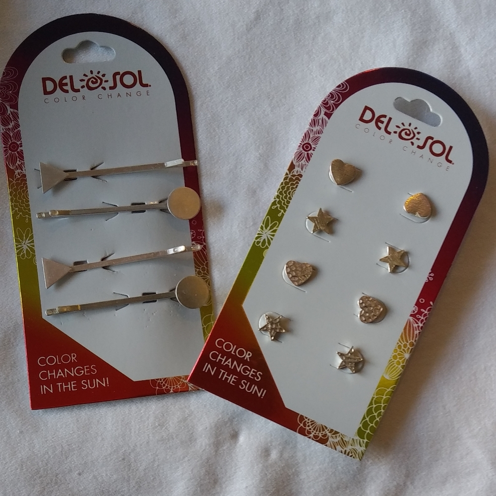 Set of 4 pair Del Sol Pierced Earrings and 2 Pair hair pins. All change color.